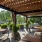 a patio with tables and chairs