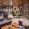 a living room with a couch and chairs